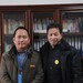  图为方云剑董事长与遂昌县民族中学校长潘文华合影留念。